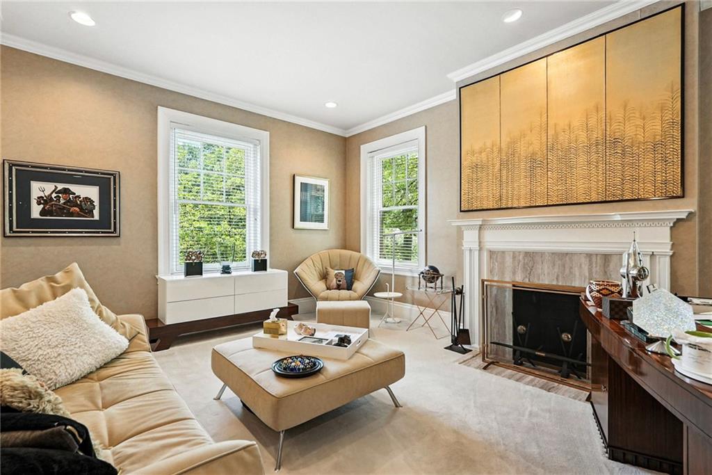 400 Devonshire Street Pittsburgh, PA 15213 - Photo 34 of 49 a living room with furniture and a fireplace