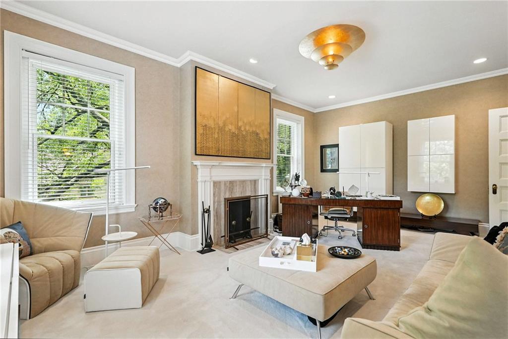 400 Devonshire Street Pittsburgh, PA 15213 - Photo 35 of 49 a living room with furniture fireplace and a large window
