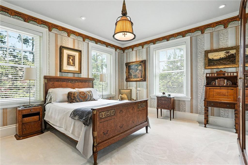 400 Devonshire Street Pittsburgh, PA 15213 - Photo 36 of 49 a bedroom with a bed and a table in it