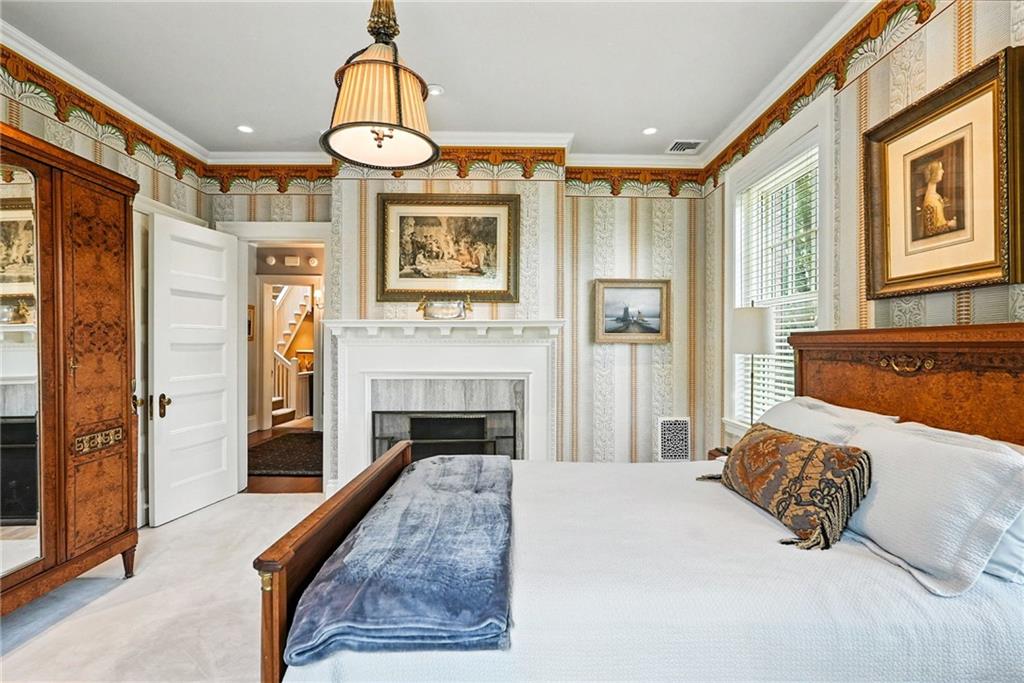 400 Devonshire Street Pittsburgh, PA 15213 - Photo 37 of 49 a living room with furniture and a fireplace