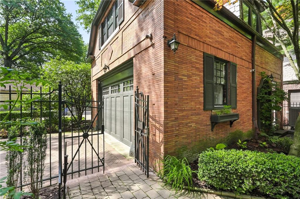 400 Devonshire Street Pittsburgh, PA 15213 - Photo 45 of 49 a front view of a house with a garden