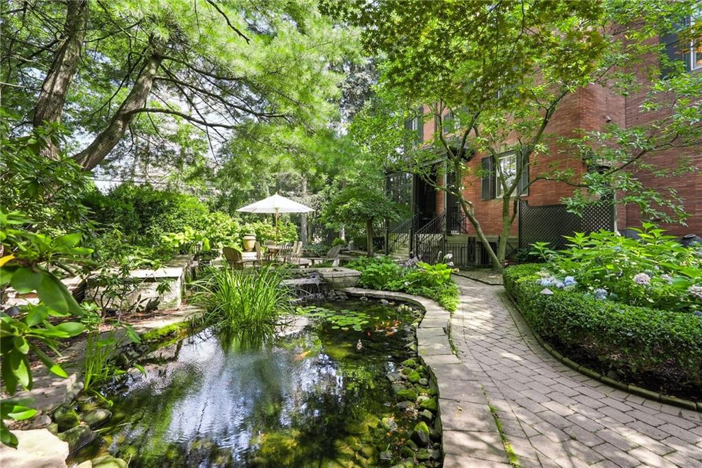 400 Devonshire Street Pittsburgh, PA 15213 - Photo 47 of 49 a backyard of a house with a garden and plants
