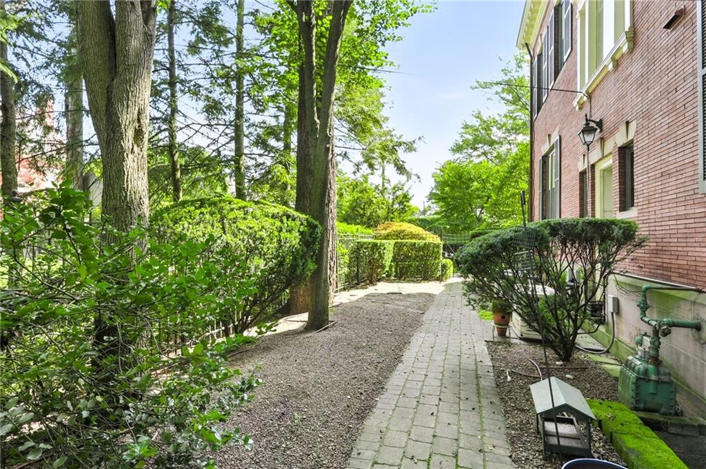 400 Devonshire Street Pittsburgh, PA 15213 - Photo 49 of 49 a view of a pathway with plants and large trees