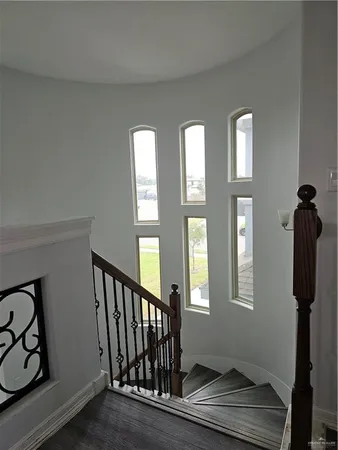 a view of entryway with wooden floor
