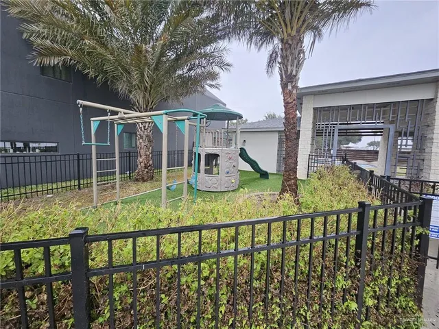 a room with gym equipment and a window