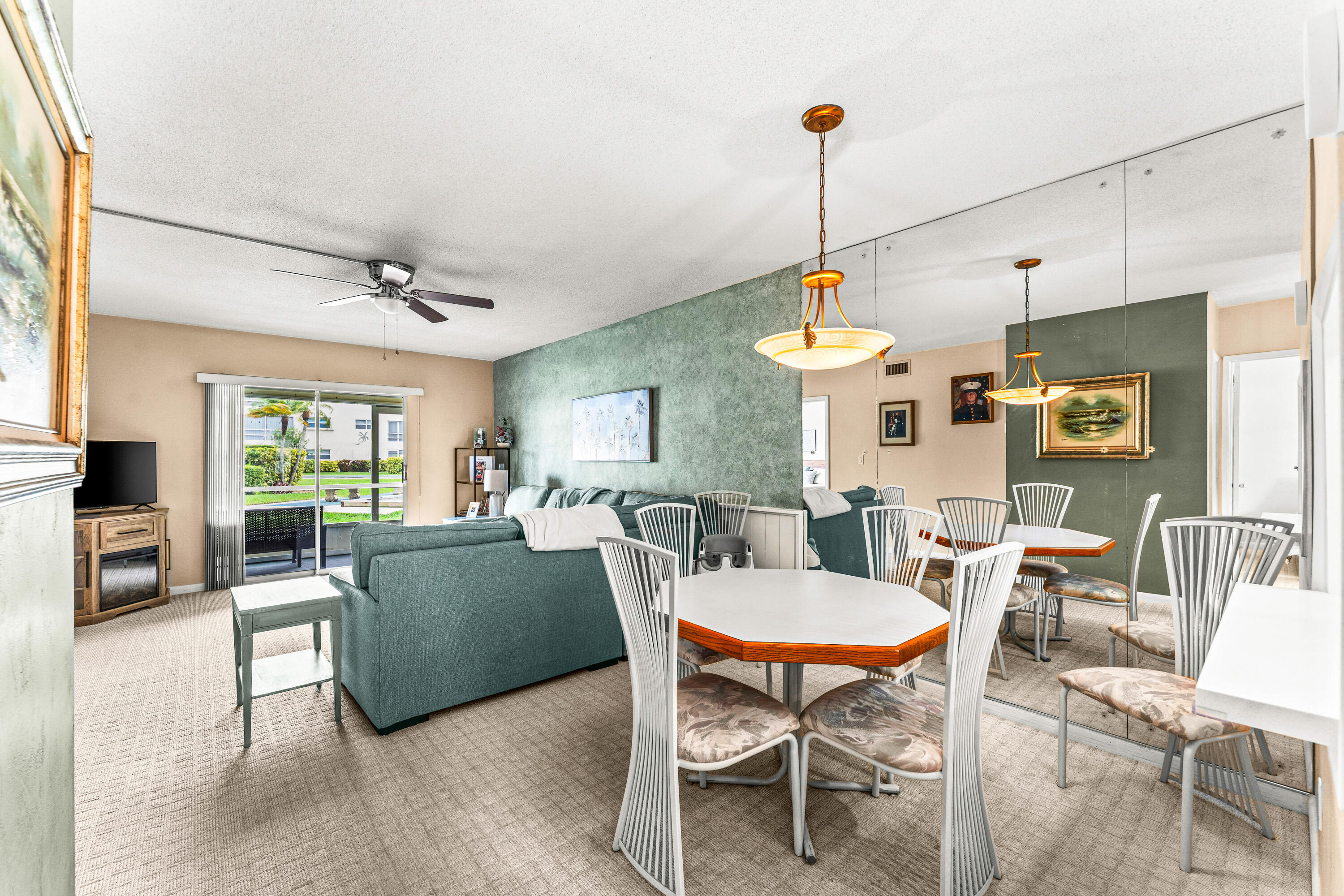 1951 Northeast 39th Street, Unit 131 Lighthouse Point, FL 33064 - Photo 30 of 31 a view of a dining room with furniture window and outside view