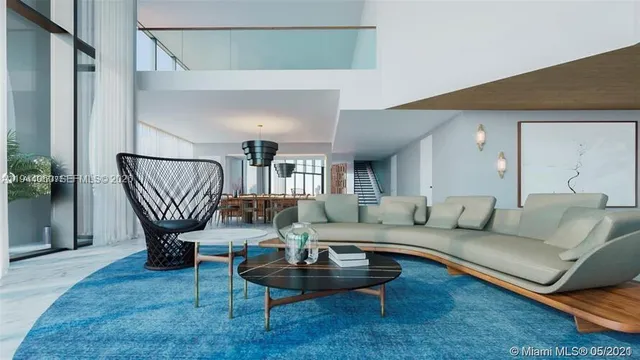 a living room with furniture a lamp and a potted plant