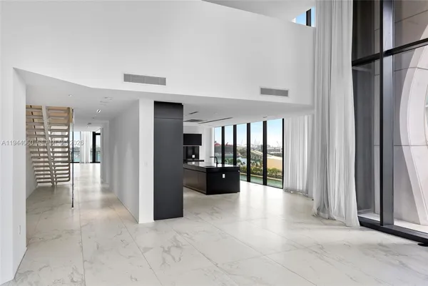a bathroom with a shower and a toilet