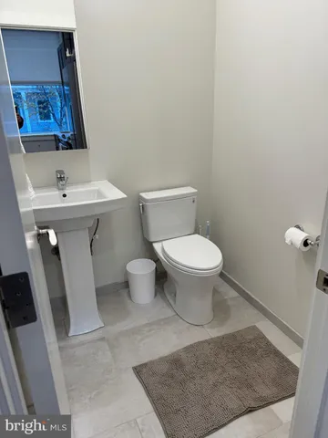 a bathroom with a sink and a toilet