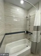 a bathroom with a bathtub