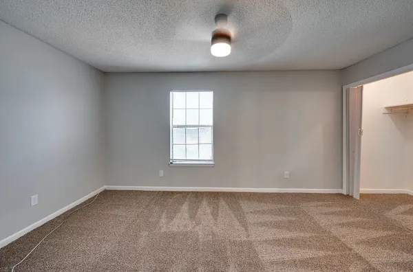 an empty room with a window