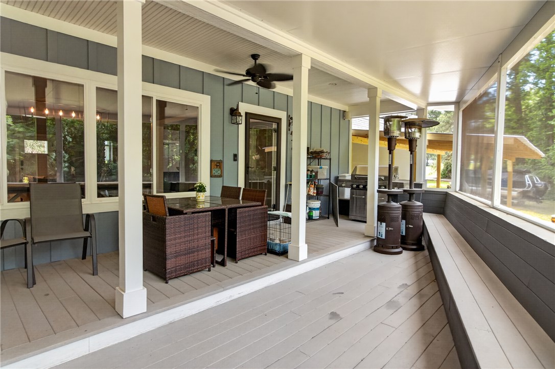 1504 Double Springs Road Townville, SC 29689 - Photo 18 of 41 This spacious screened porch offers a perfect blend of indoor comfort and outdoor enjoyment.