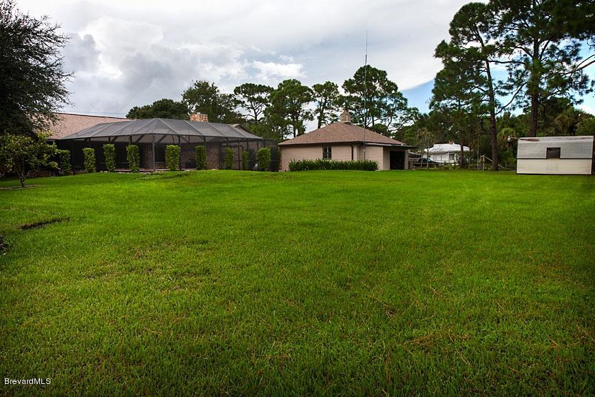2751 Harlock Road Melbourne, FL 32934 - Photo 13 of 25 Back_Yard_Pool_Enclosure(1)