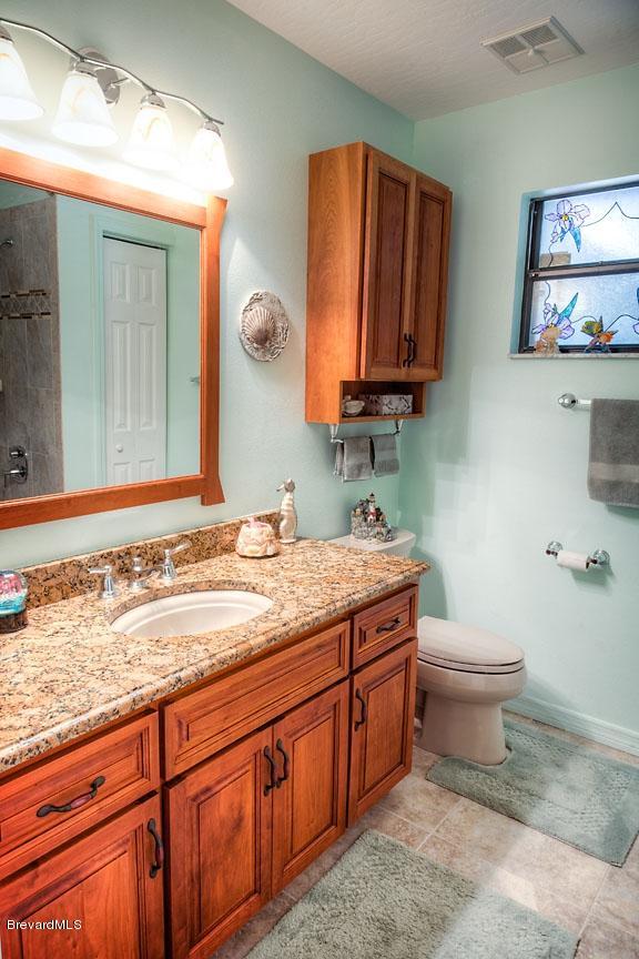 2751 Harlock Road Melbourne, FL 32934 - Photo 17 of 25 Guest_Bathroom