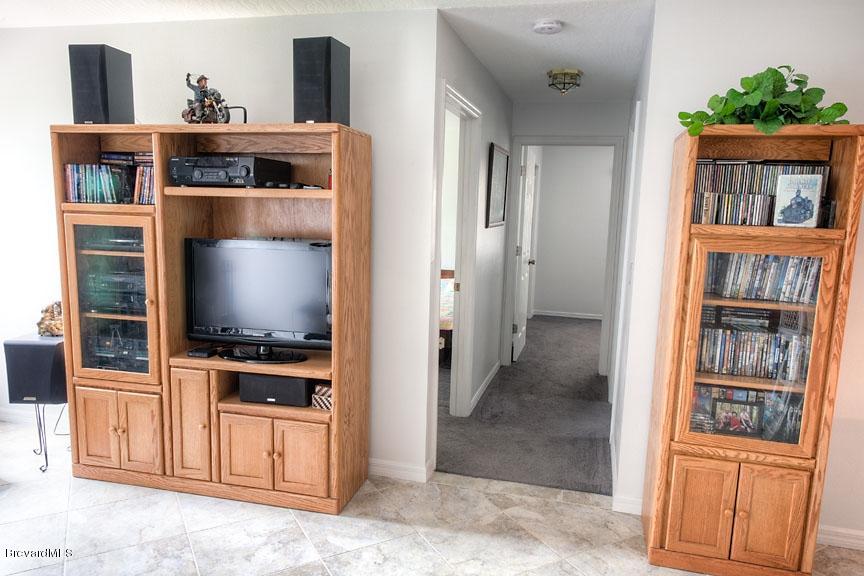 2751 Harlock Road Melbourne, FL 32934 - Photo 19 of 25 Hallway_To_Bedroom_#2_And_#3