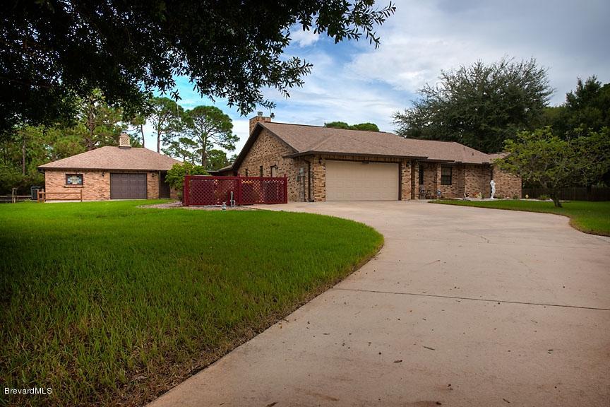 2751 Harlock Road Melbourne, FL 32934 - Photo 21 of 25 Front_Of_House_And_Outbuilding