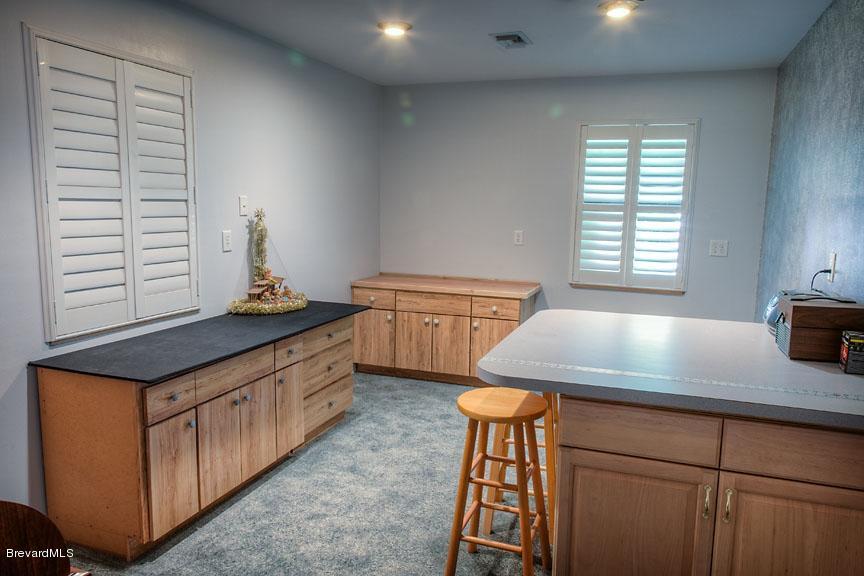 2751 Harlock Road Melbourne, FL 32934 - Photo 23 of 25 Outbuilding_Craft_Room