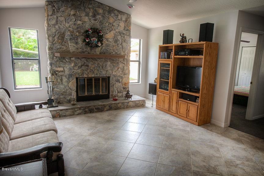 2751 Harlock Road Melbourne, FL 32934 - Photo 5 of 25 Family_Room_And_Fireplace