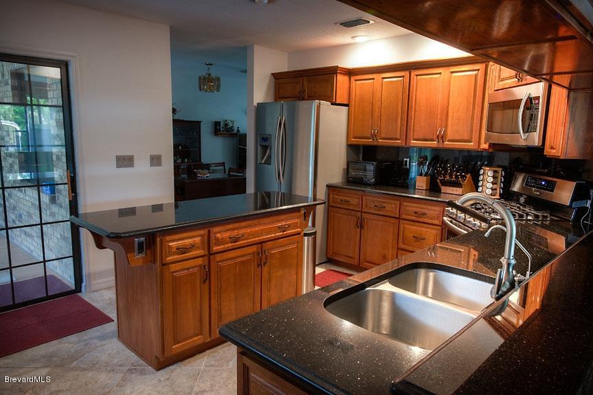 2751 Harlock Road Melbourne, FL 32934 - Photo 6 of 25 Kitchen_#1
