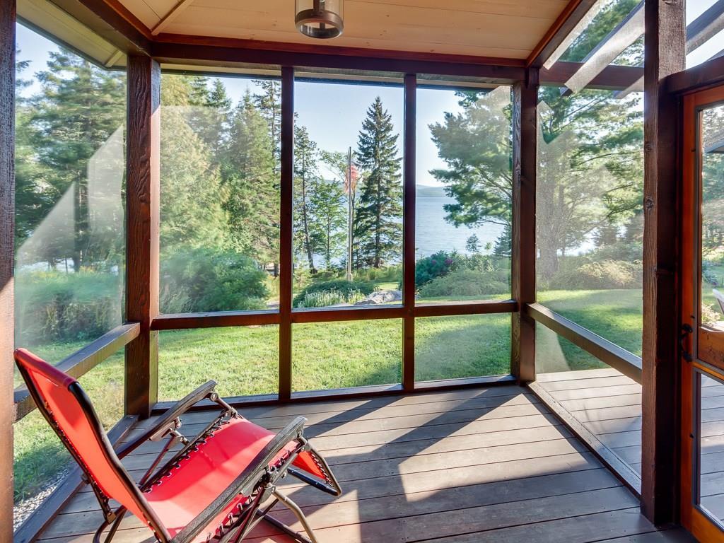 118 Wigton Road Rangeley, ME 04970 - Photo 18 of 35 Master bedroom screened sitting...