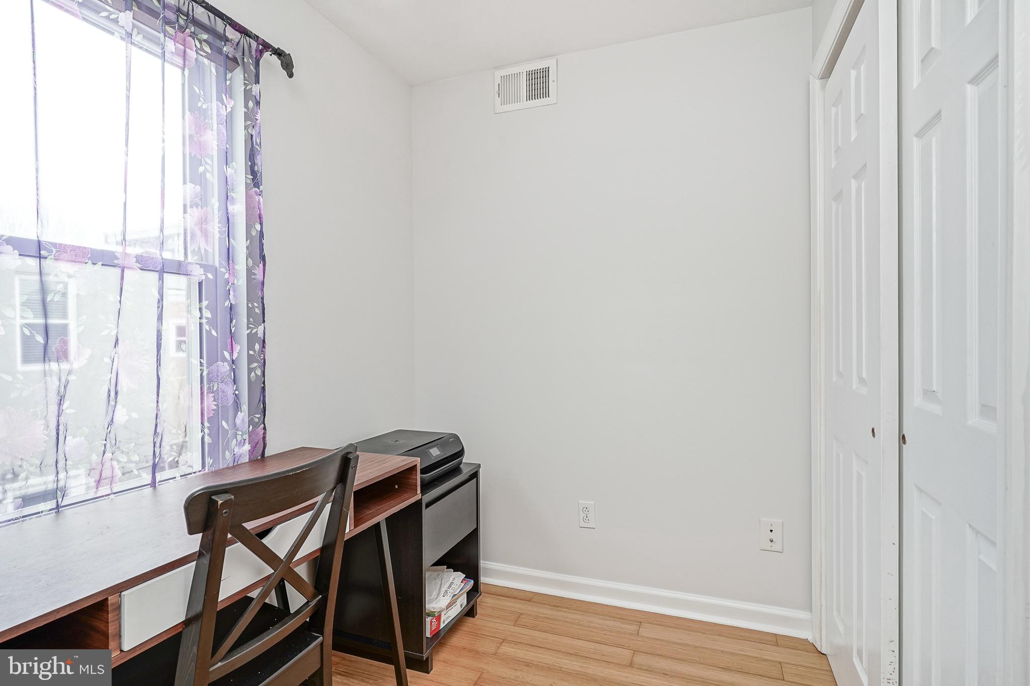 2111 Manton Street Philadelphia, PA 19146 - Photo 16 of 37 a view of a workspace with furniture and a window