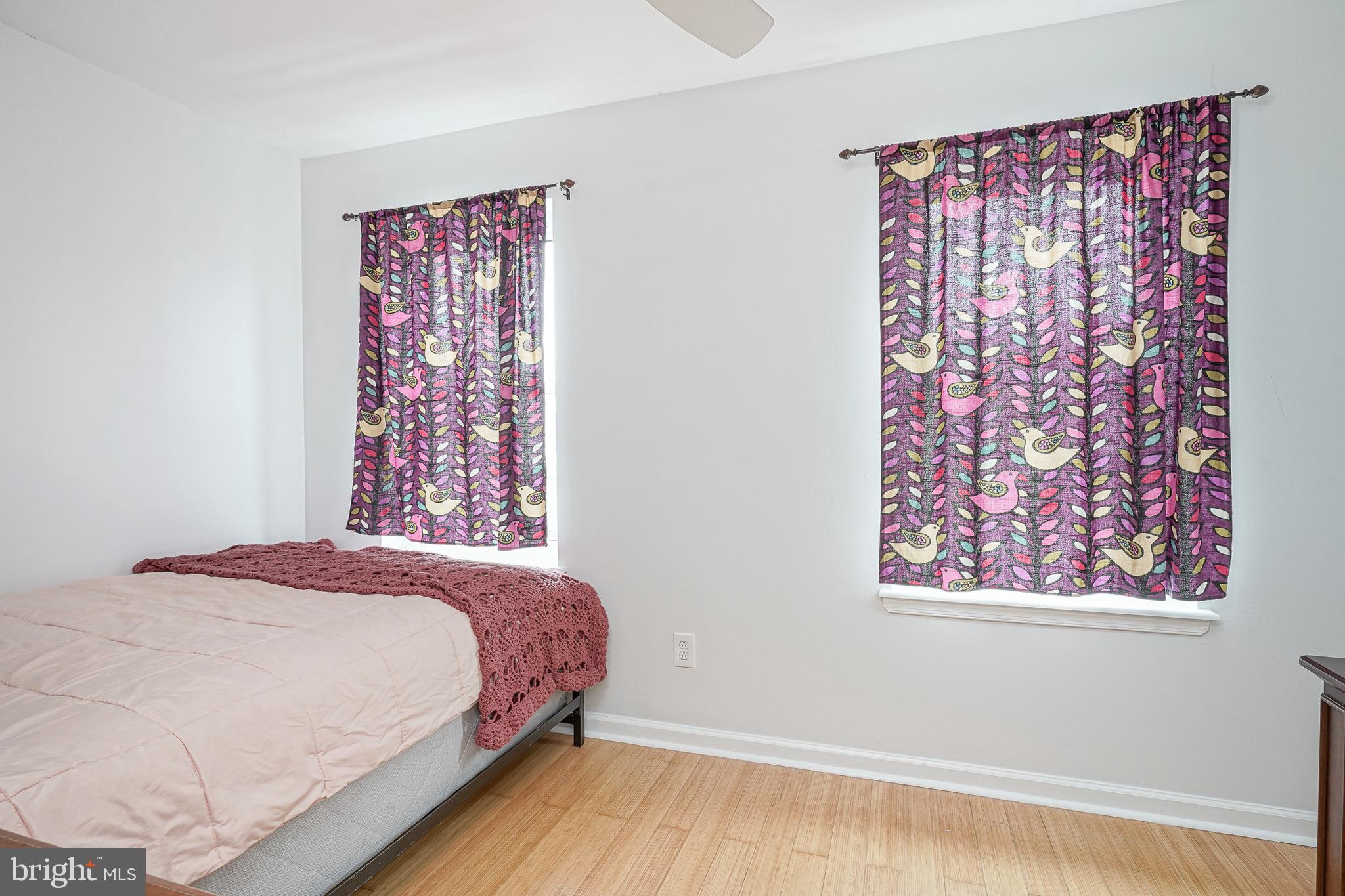 2111 Manton Street Philadelphia, PA 19146 - Photo 17 of 37 a bedroom with a bed and a painting on the wall