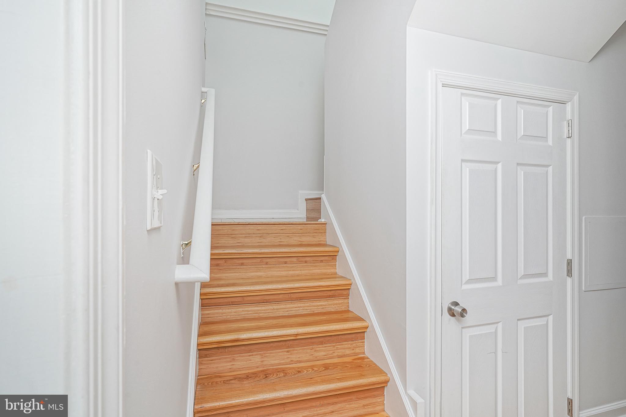 2111 Manton Street Philadelphia, PA 19146 - Photo 21 of 37 a view of a hallway with wooden floor and entryway