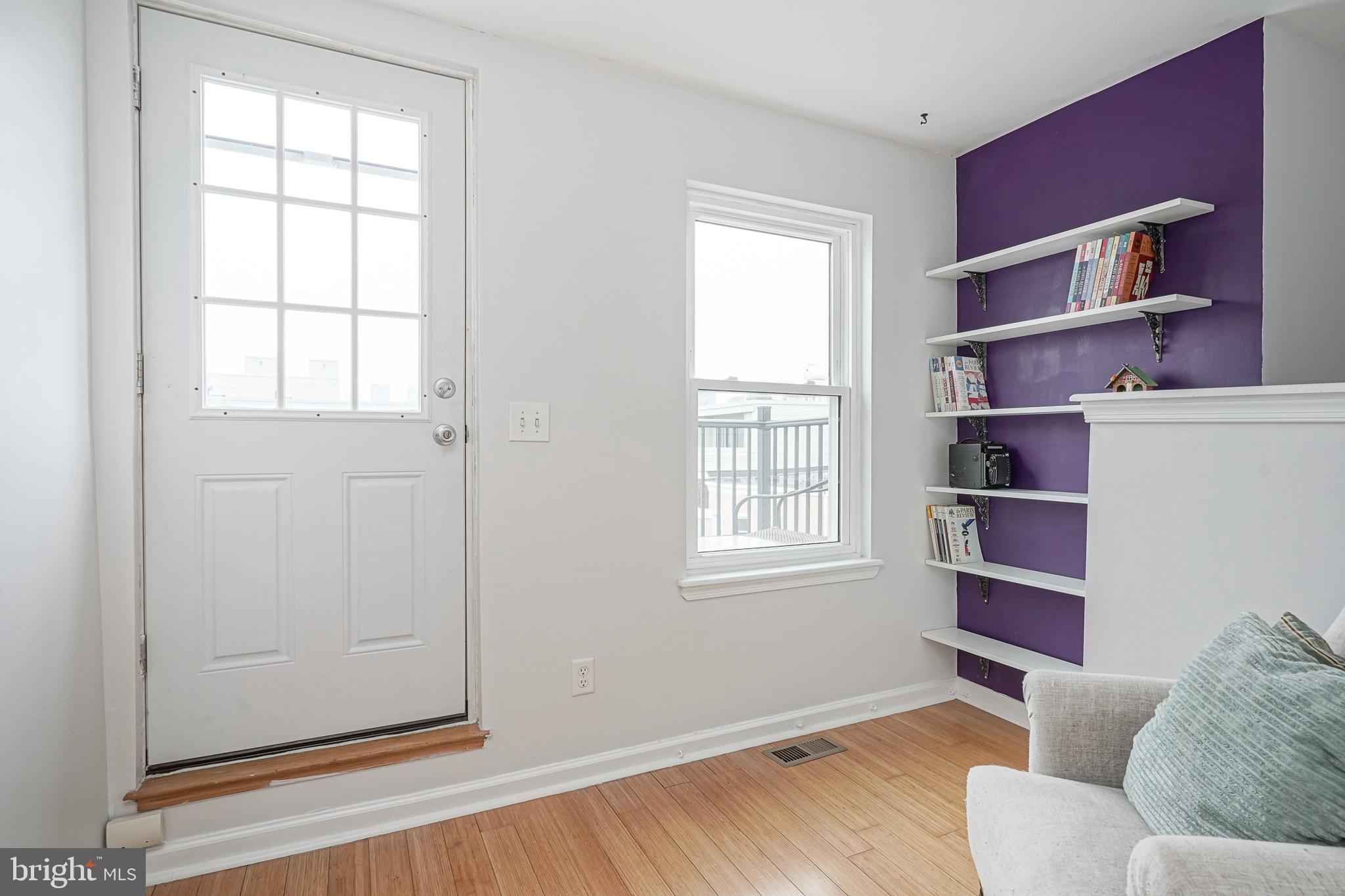 2111 Manton Street Philadelphia, PA 19146 - Photo 22 of 37 a living room with furniture cabinets and window