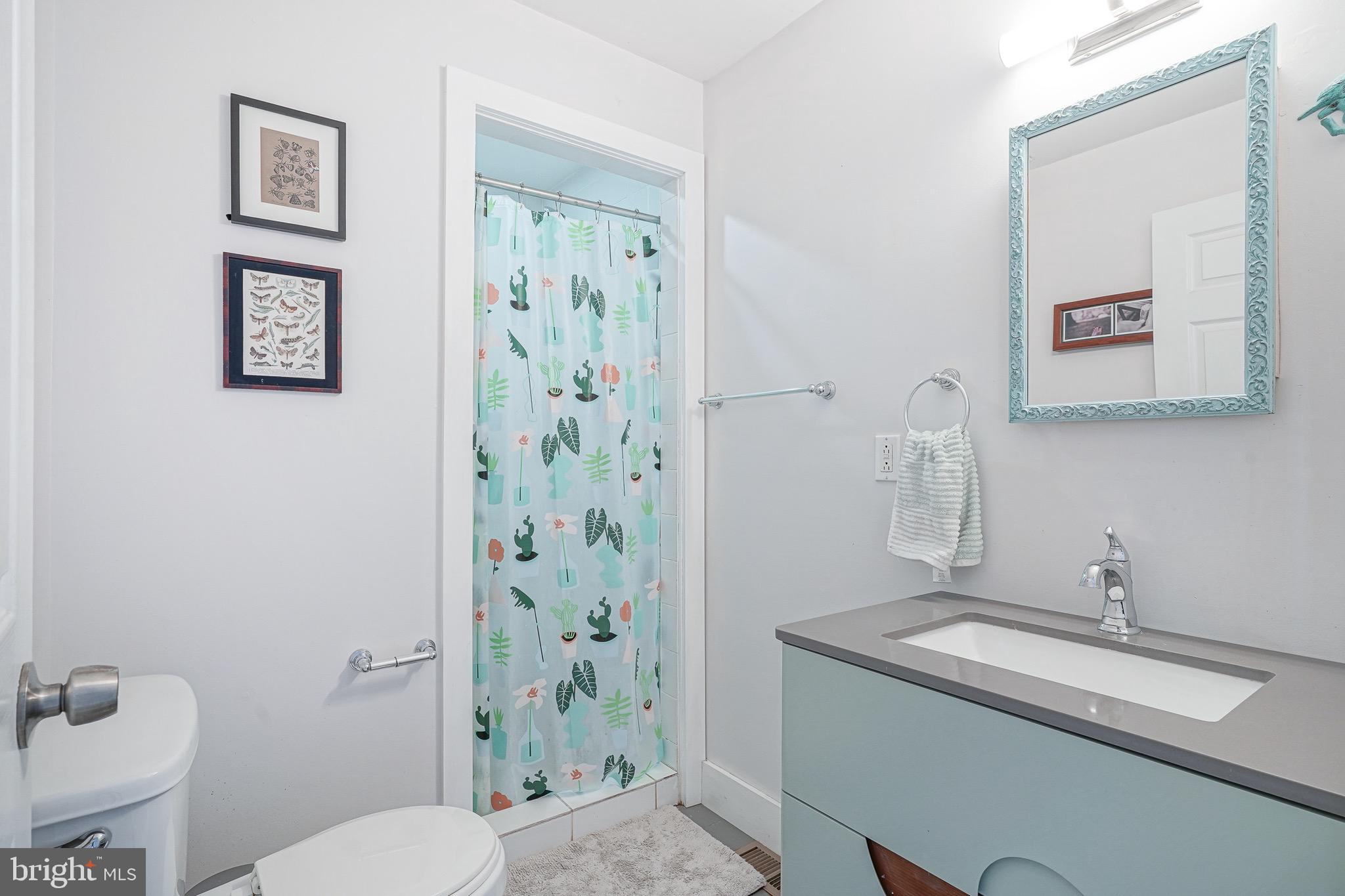 2111 Manton Street Philadelphia, PA 19146 - Photo 25 of 37 a bathroom with a sink toilet and shower