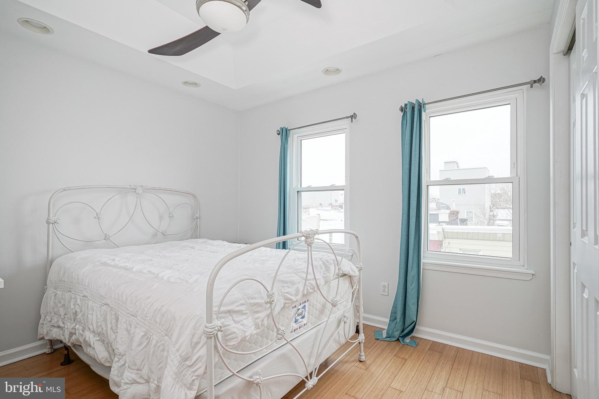 2111 Manton Street Philadelphia, PA 19146 - Photo 27 of 37 a bedroom with a bed and a window
