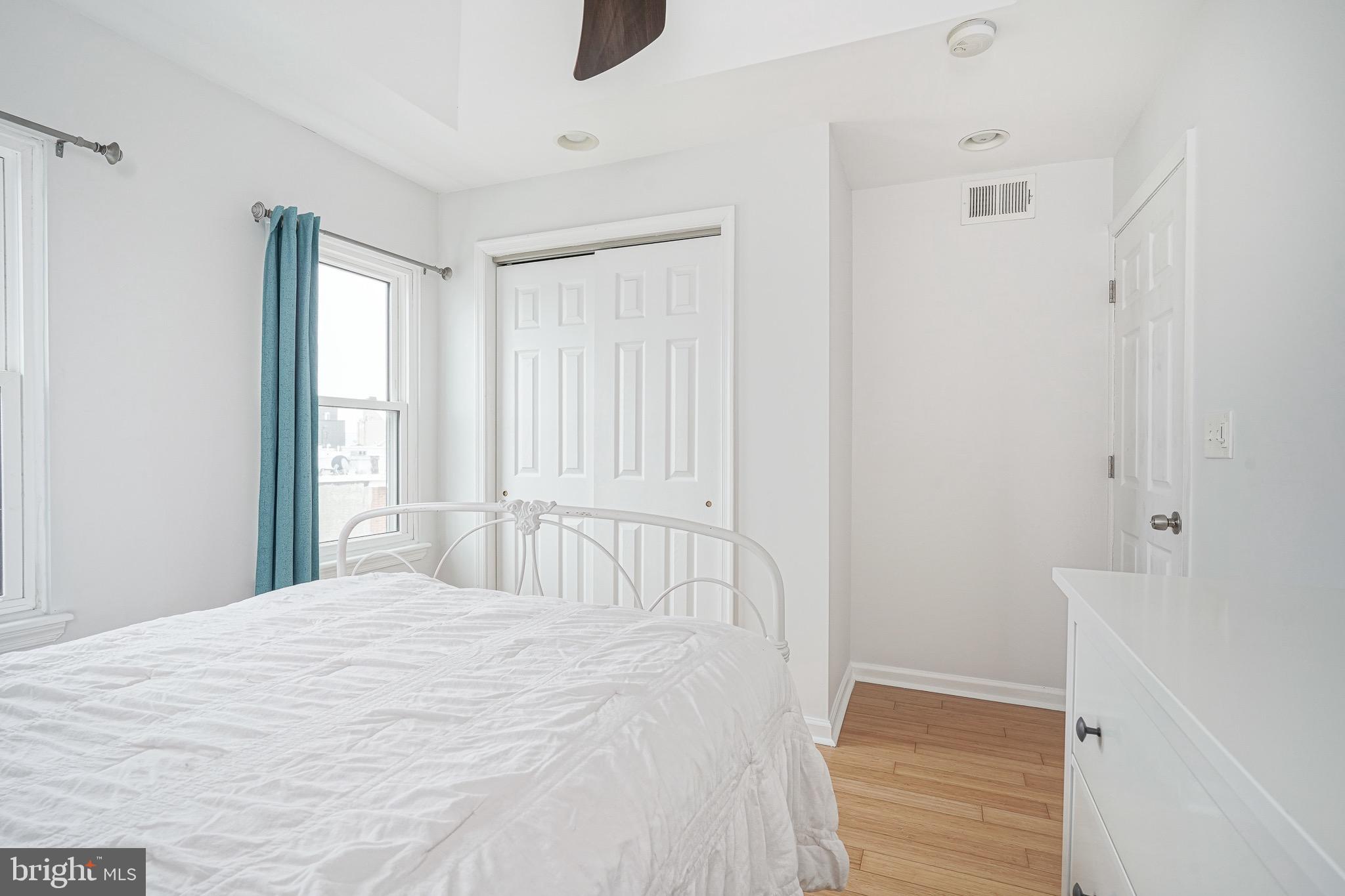 2111 Manton Street Philadelphia, PA 19146 - Photo 28 of 37 a bedroom with a bed and a window