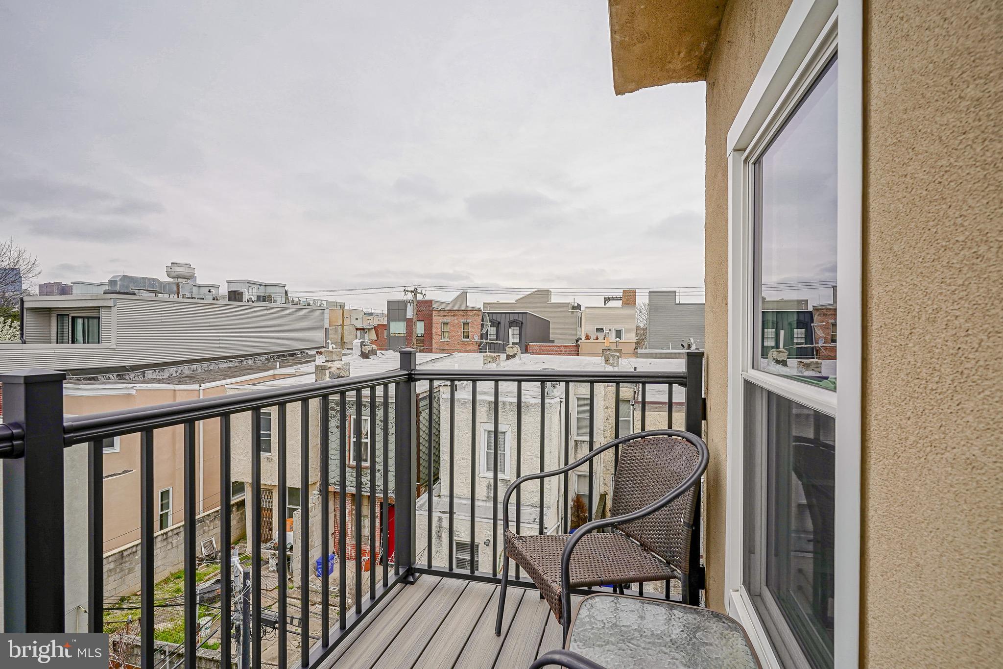 2111 Manton Street Philadelphia, PA 19146 - Photo 30 of 37 a view of a balcony with wooden floor