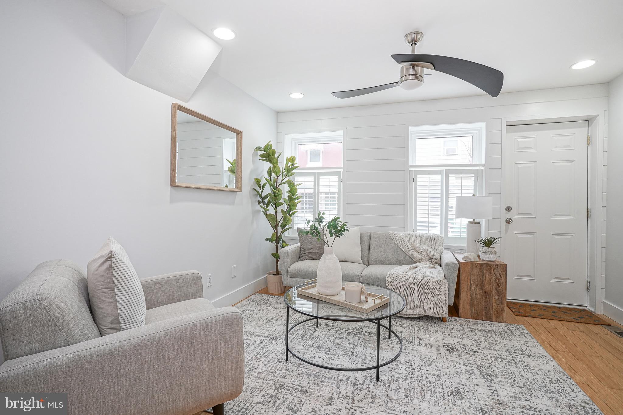 2111 Manton Street Philadelphia, PA 19146 - Photo 3 of 37 a living room with furniture and a wooden floor