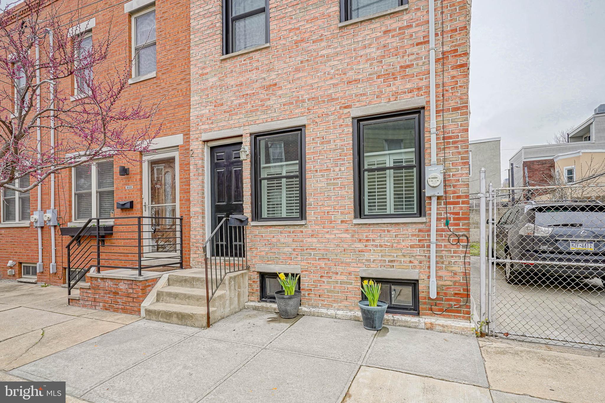 2111 Manton Street Philadelphia, PA 19146 - Photo 33 of 37 a view of a brick building with many windows