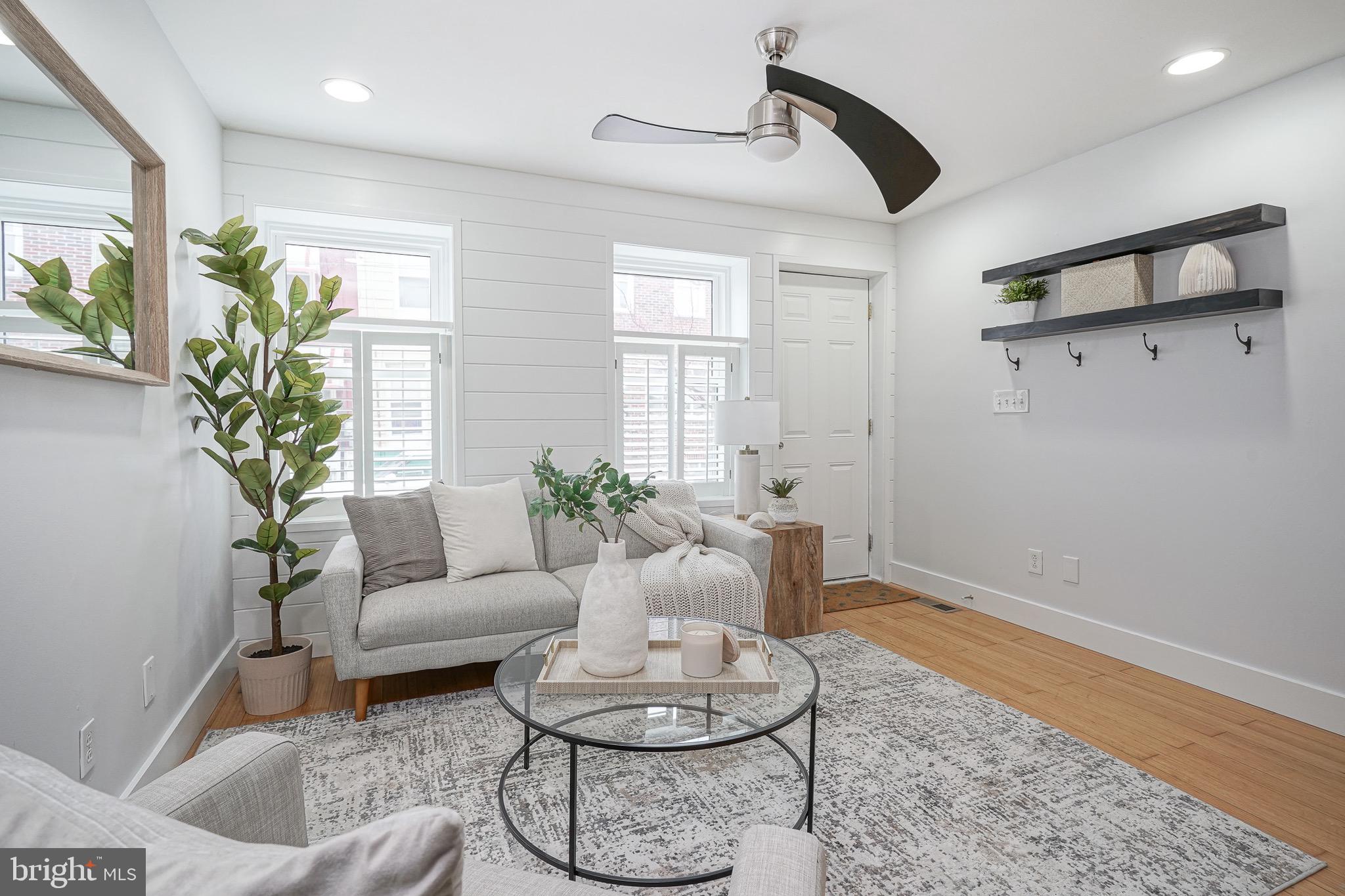 2111 Manton Street Philadelphia, PA 19146 - Photo 4 of 37 a living room with furniture and a potted plant