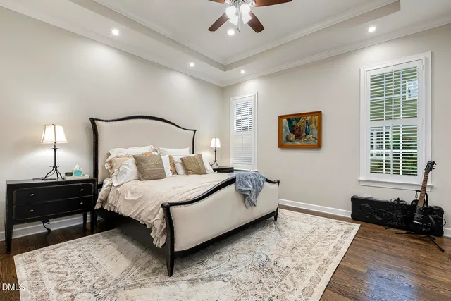 a spacious bathroom with a shower sink and a mirror
