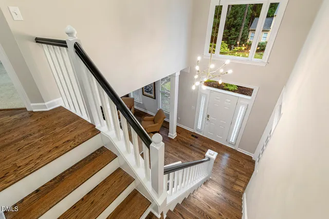 a living room with furniture a window and wall