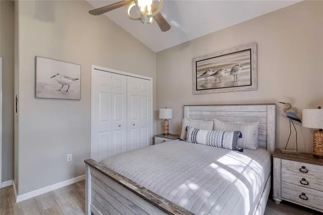 a bedroom with a bed and a dresser