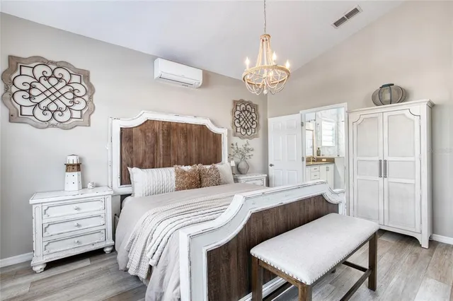 a bathroom with double sink shower and a mirror