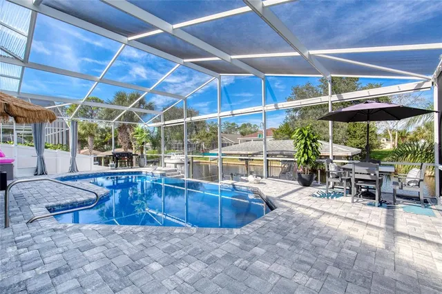 a front view of a building with sitting area