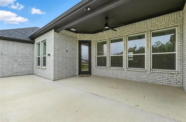 a view of house with large windows