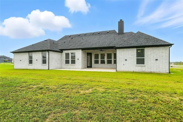 a house view with a garden space