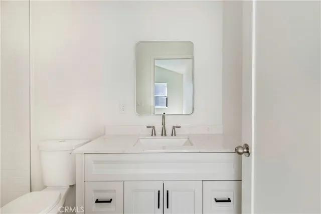 a bathroom with a shower and a toilet