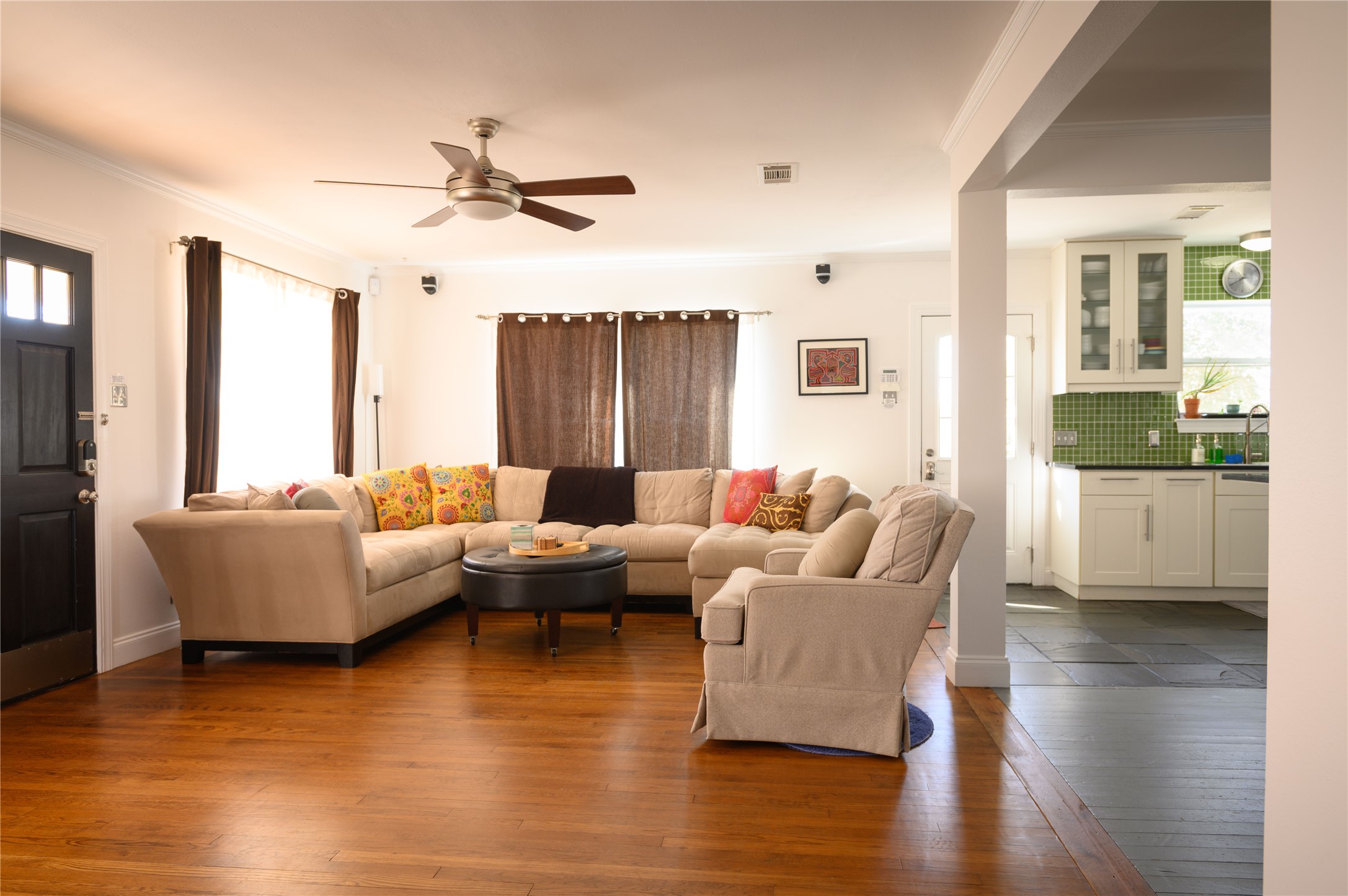 4902 Pecan Springs Road Austin, TX 78723 - Photo 19 of 40 a living room with furniture and a large window