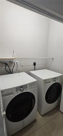 a bathroom with a sink a mirror and shower