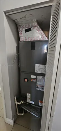 a view of a room that has a window