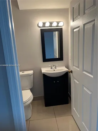 a bathroom with a sink and a toilet