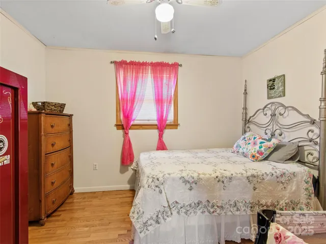 a bedroom with a bed and a closet