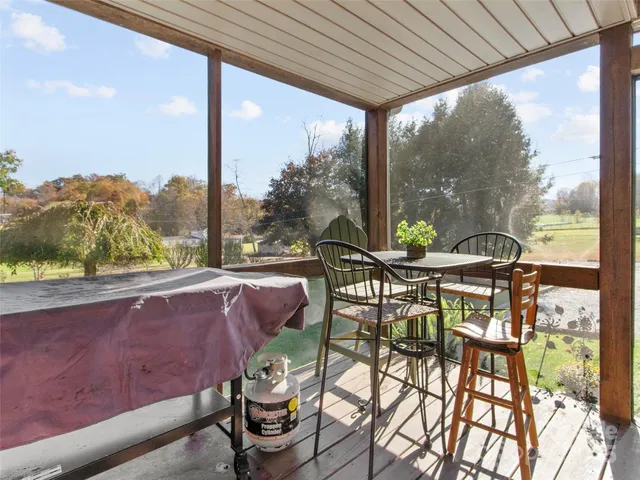 a view of an outdoor dining space with furniture
