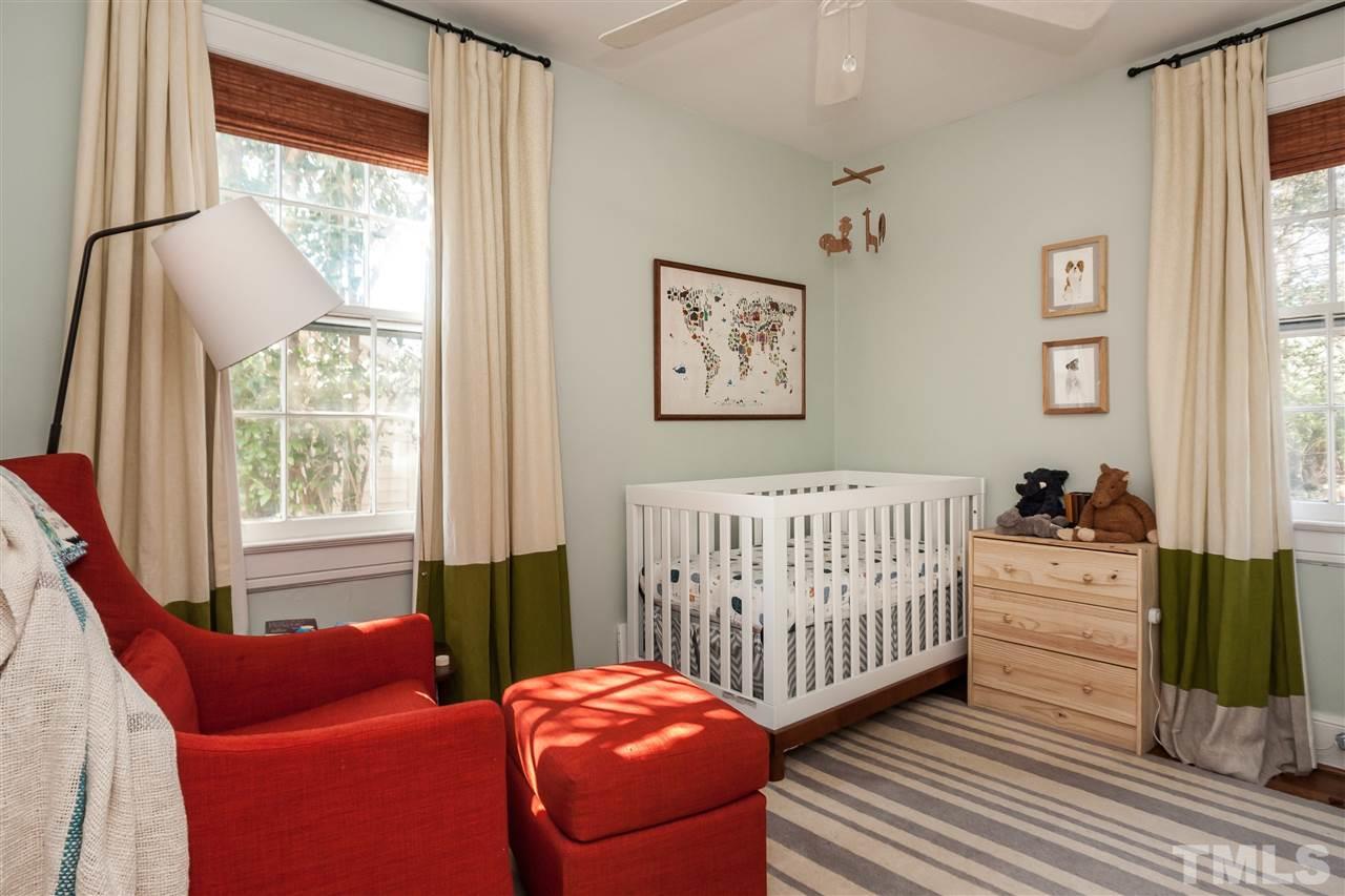 1507 Hanover Street Raleigh, NC 27608 - Photo 11 of 16 The second bedroom is set up as a nursery. It faces the backyard so could be a quiet office or guest room.